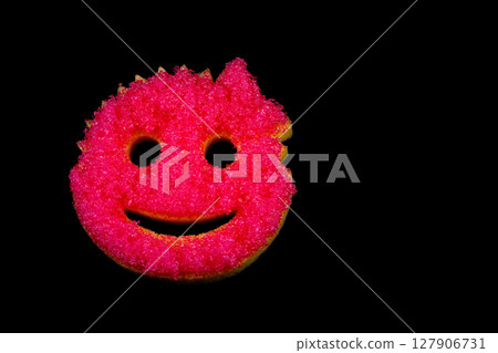 Old Worn Washing Up Sponge Isolated on a Black Background Old Worn Washing Up Sponge Isolated on a Black Background 127906731