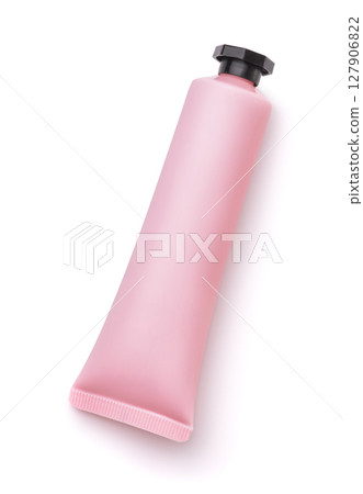 Top view of pink plastic cosmetic tube 127906822
