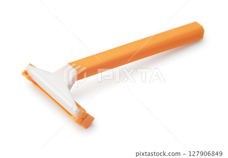 Plastic orange disposable shaving razor 127906849