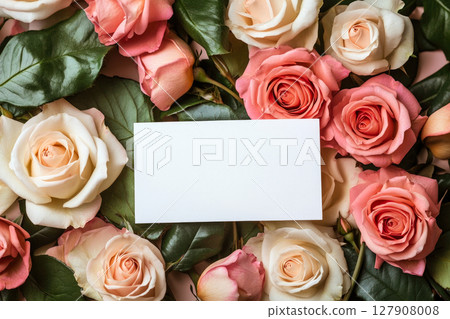 Paper card and bouquet of roses for Valentines or mother, woman day. Top view. Paper card and bouquet of roses for Valentines or mother, woman day. Top view. 127908008