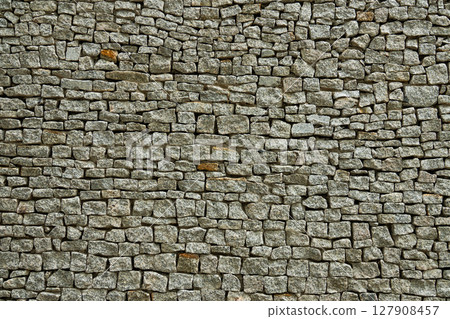 beautiful stone texture on an ancient building 127908457