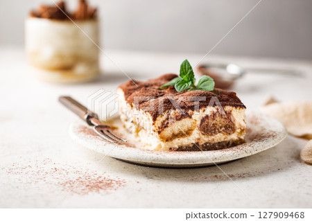 Traditional Italian dessert tiramisu 127909468