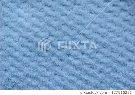 Colorful towel background. One soft terry towel. 127910231