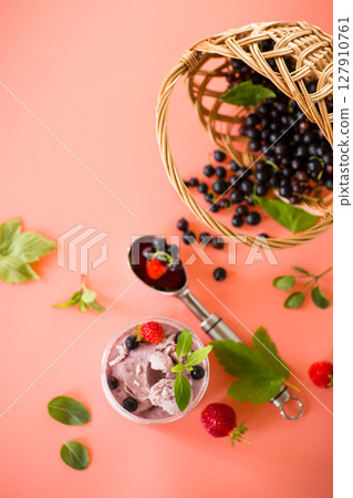 Berry ice cream with natural ingredients on background Berry ice cream with natural ingredients on background 127910761