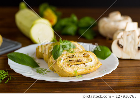 Zucchini roll with baked mushrooms and cheese Zucchini roll with baked mushrooms and cheese 127910765