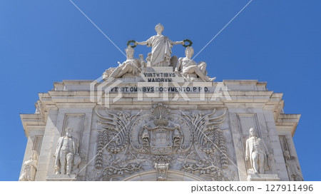 Details of stone archway of Praca do Comercio. Also known as Commerce Square, it is one of the most iconic and grand public squares in Lisbon, Portugal. Details of stone archway of Praca do Comercio. Also known as Commerce Square, it is one of the most iconic and grand public squares in Lisbon, Portugal. 127911496