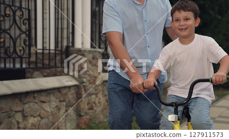 father teaches child ride bike, mother father, adrenaline horse riding, boy laughs smiling sitting bike outdoors, child riding father mother nature, together riding child kid bike, horse riding, walk father teaches child ride bike, mother father, adrenaline horse riding, boy laughs smiling sitting bike outdoors, child riding father mother nature, together riding child kid bike, horse riding, walk 127911573
