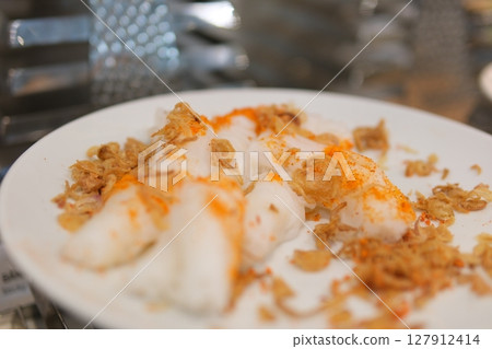 rice pancakes. rice thin vermicelli made on a plate 127912414