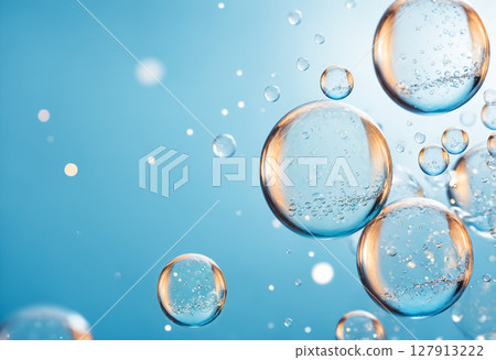 vibrant and luminous background featuring various transparent bubbles of different sizes floating in clear blue liquid with sparkling highlights vibrant and luminous background featuring various transparent bubbles of different sizes floating in clear blue liquid with sparkling highlights 127913222