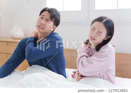 A couple who are tired even after sleep A couple who are tired even after sleep 127913801