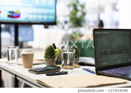 Empty modern office setup with advanced technology enhances productivity, helping professionals focus on financial strategies, performance metrics and global business objectives. 127914046