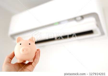 Save money with air conditioners and piggy banks Save money with air conditioners and piggy banks 127914201