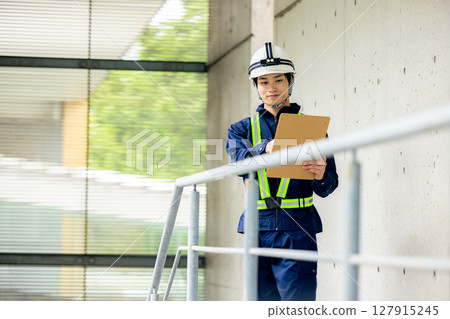 People working at construction sites 127915245
