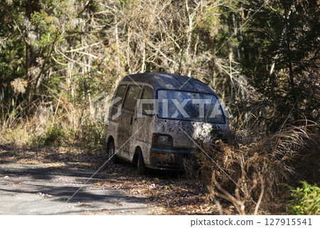 Abandoned van in the mountains 127915541