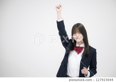 High school girl doing a fist pump 127915644