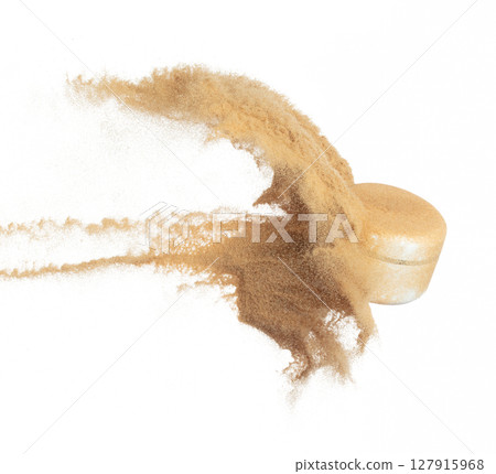 Cosmetic container white bottle fly splashing in mid air. Moisturizer lotion cream bottle explosion flying with sand powder dust under dry sun. White background isolated high speed shutter freeze 127915968