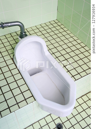 Japanese style toilet Japanese style toilet 127916934