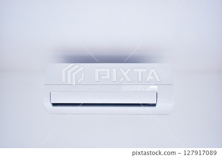 white air conditioner on wall, electricity object in home 127917089