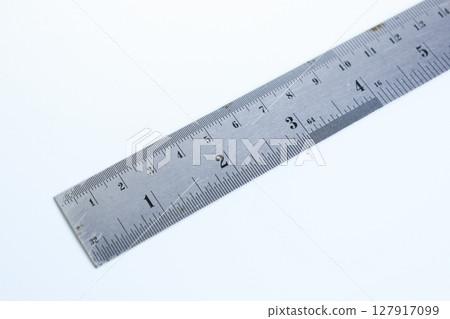 metal ruler isolated on white background, object for education 127917099