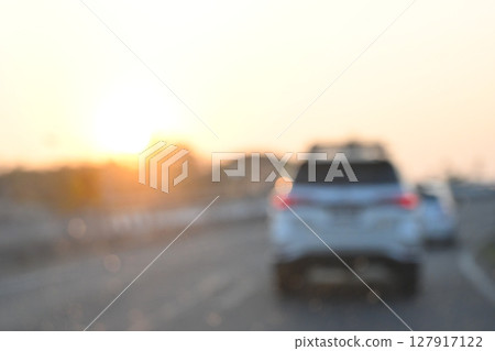highway traffic with safety barrier on road asphalt, blurred image highway traffic with safety barrier on road asphalt, blurred image 127917122