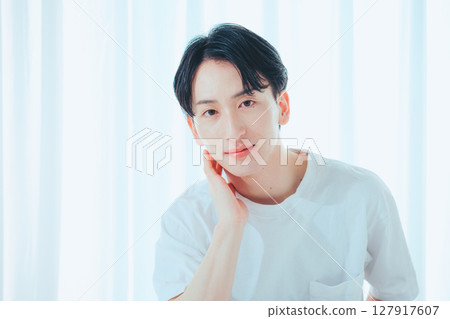 A simple portrait of light and smiles 127917607