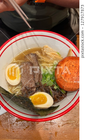 Delicious Ramen Bowl with Egg, Beef, and Seaweed Ready to Eat, Japanese Cuisine 127917873