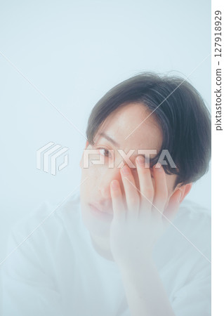 Wrapped in a soft veil - an ennui gaze 127918929