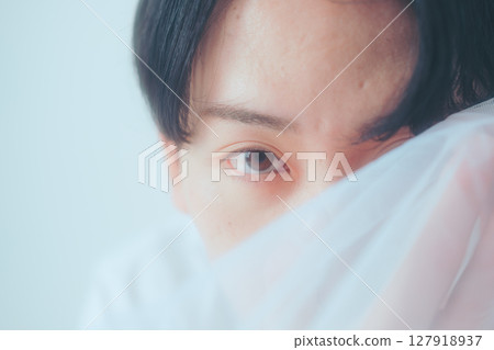 Wrapped in a soft veil - an ennui gaze Wrapped in a soft veil - an ennui gaze 127918937