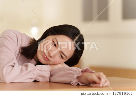 Woman feeling down at night 127919162