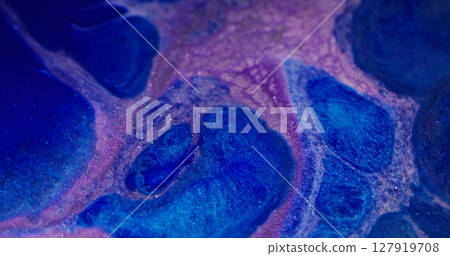 Lilac splatter. Shimmer texture. Defocused purple blue color ink sparkling liquid glitter stream floating on abstract art background. 127919708