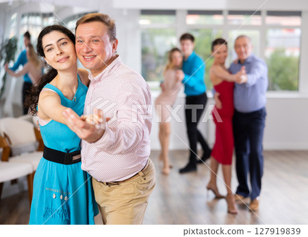 Man and woman dancing Man and woman dancing 127919839