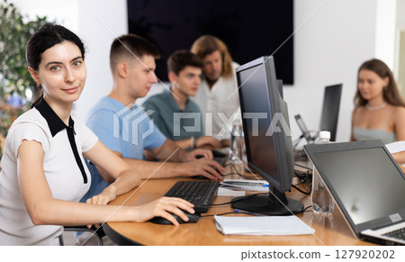 Female student is engrossed Female student is engrossed 127920202