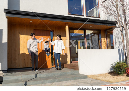 Young family, home, entrance Young family, home, entrance 127920539