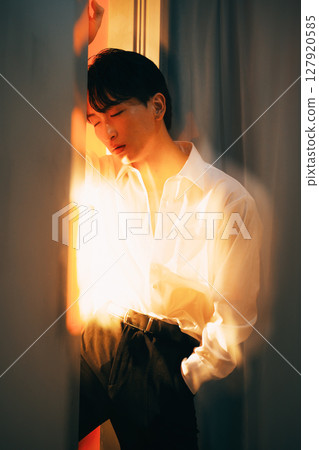 Korean style young businessman white shirt portrait in evening light Korean style young businessman white shirt portrait in evening light 127920585