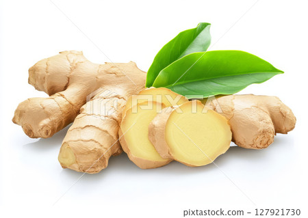 Fresh ginger rhizome with sliced pieces and green leaves, showcasing its natural beauty 127921730