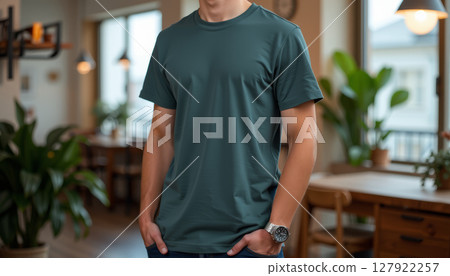 Plain t shirt in cozy indoor setting, showcasing relaxed style and comfort Plain t shirt in cozy indoor setting, showcasing relaxed style and comfort 127922257