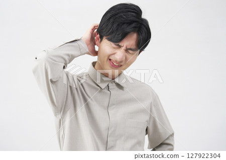 Male, 20s, troubled, white background Male, 20s, troubled, white background 127922304