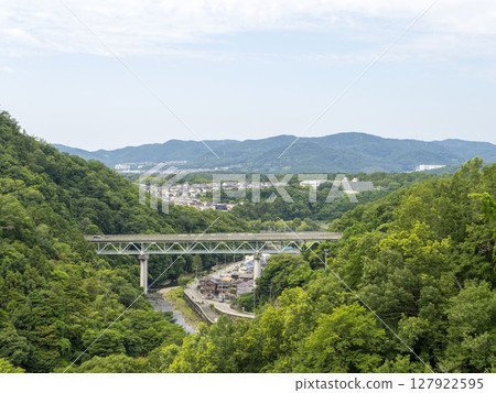 A national highway bridge spanning a valley 127922595