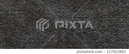 Dark gray fluffy textile background with macro texture and black soft looped surface for cozy fabric design Dark gray fluffy textile background with macro texture and black soft looped surface for cozy fabric design 127922665