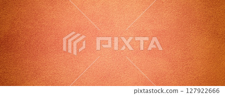 Orange suede fabric background with matte velvet texture, coral and peach tones and soft felt surface in macro 127922666