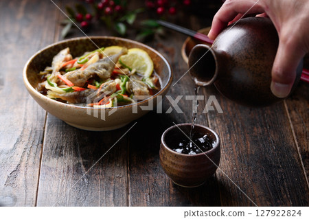 Hot sake and marinated horse mackerel 127922824