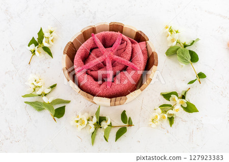 Spa products for facial and body care with soft terry towel. Spa products for facial and body care with soft terry towel. 127923383