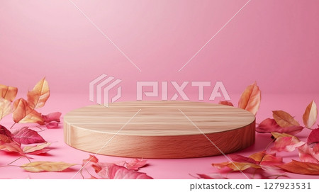 Yellow autumn leaves and simple wooden podium stage display promotion pink background 127923531