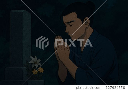 一名年輕男子在墳墓前祈禱 127924558