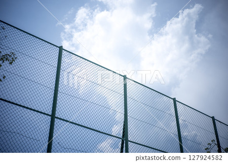 Sky over the fence Dramatic sky Summer sky Blue sky Park Image Sky over the fence Dramatic sky Summer sky Blue sky Park Image 127924582