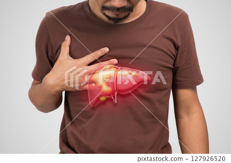 Man suffering from fatty liver disease and its painful symptoms. 127926520