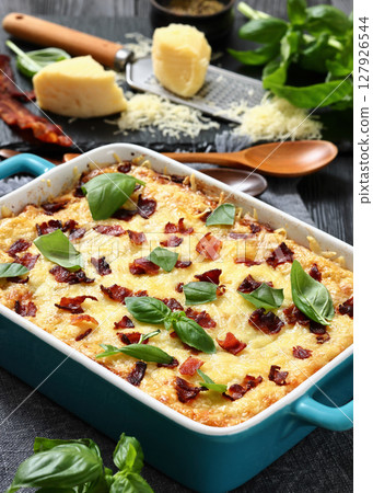 twice baked potato casserole in a baking dish twice baked potato casserole in a baking dish 127926544