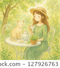 Woman and cat relaxing in the garden 127926763