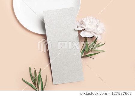 Blank 4x9 menu card mockup with peony flower and eucaliptus leaves 127927662