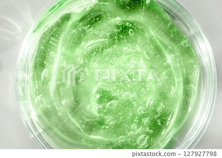 Green cosmetic gel on a white background Green cosmetic gel on a white background 127927798